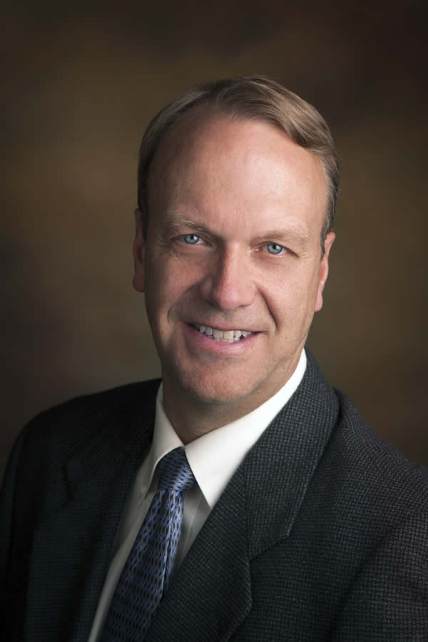 An image of the mayor Clark Wilkinson in a black suit