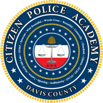 The davis county police academy logo with scale symbolize law and order