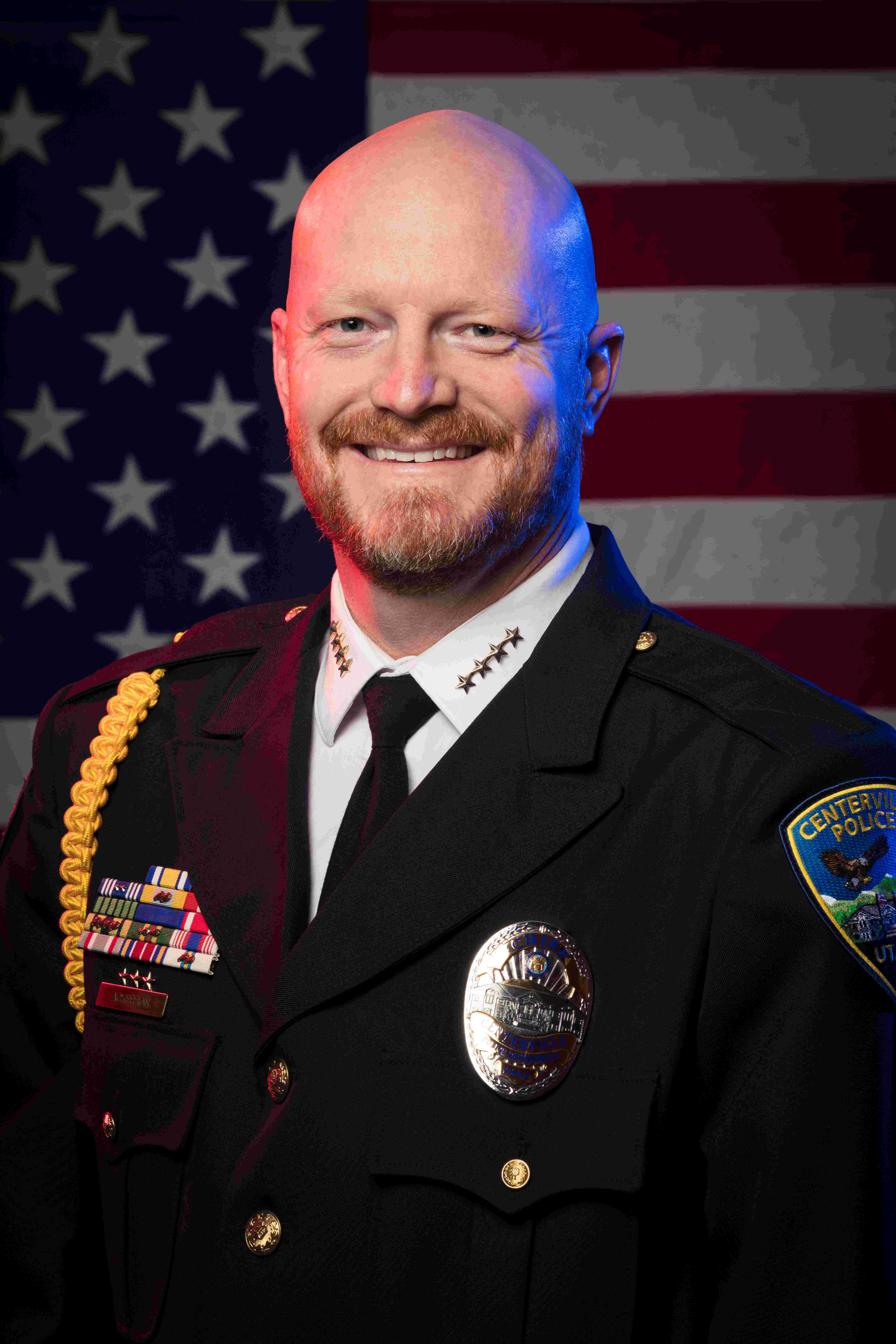A white male in a police officer uniform