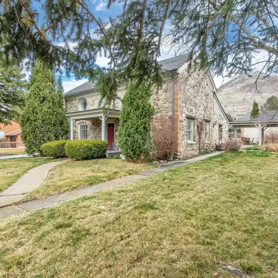 old pioneer home in Centerville Utah with brick and stone exterior