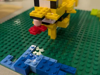 Yellow dog like creature made of legos