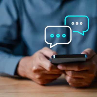 A picture of someone texting on a phone