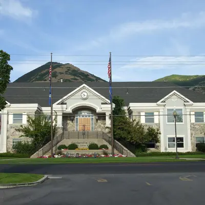 Centerville city hall building with flowers and steps on both sides of the building to enter building